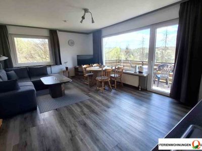 Bild des Wohnraumes in Ferienwohnung 1 der Pension Quellenhof Altenau in Haus Samantha